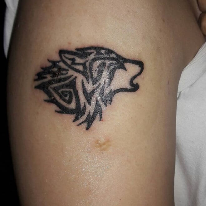 Small Tribal Wolf Tattoo