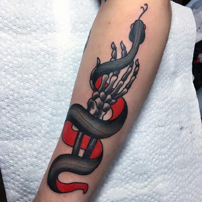 Snake Skeleton Hand Tattoo